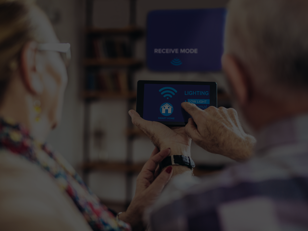 Older adult safely navigating their home with smart lighting assistance
